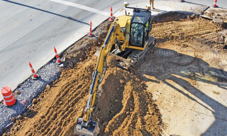 machine digging in the dirt