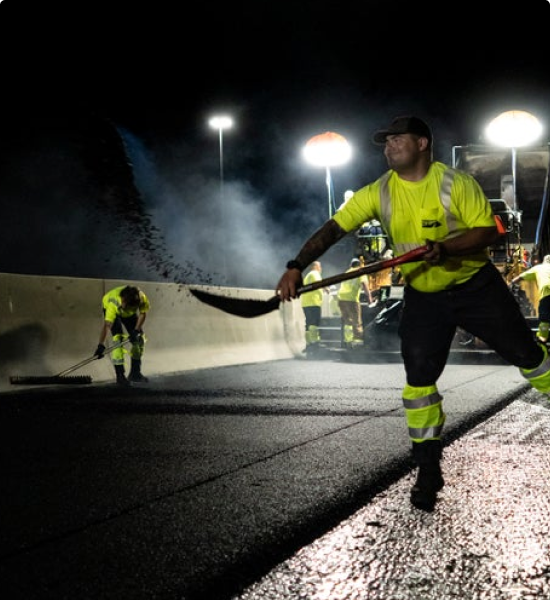 construction worker holding a spade