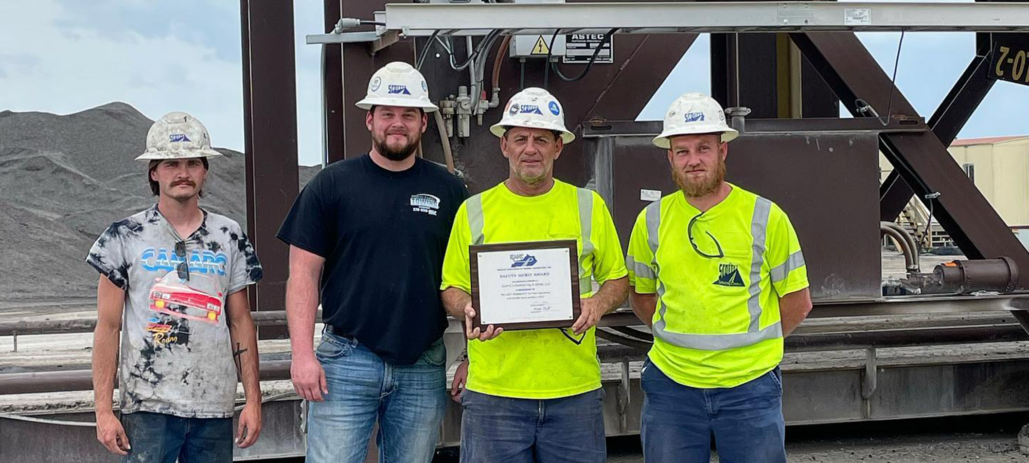 asphalt crew accepts award