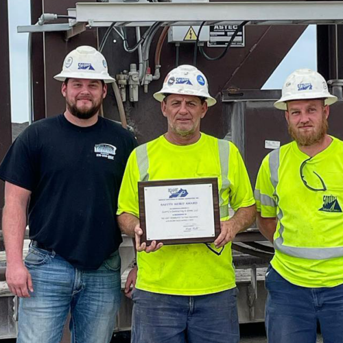 asphalt crew accepts award