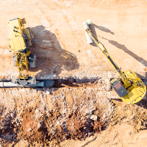 Construction machine moving dirt